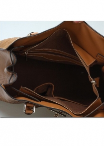 Лакированная кожаная сумка с тиснением под рептилию