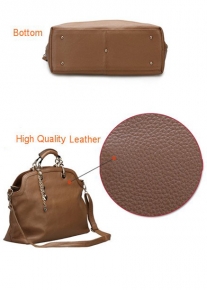 Сумка из натуральной кожи украшенная цепочкой